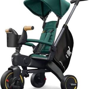 Doona Trike with carrier in Green